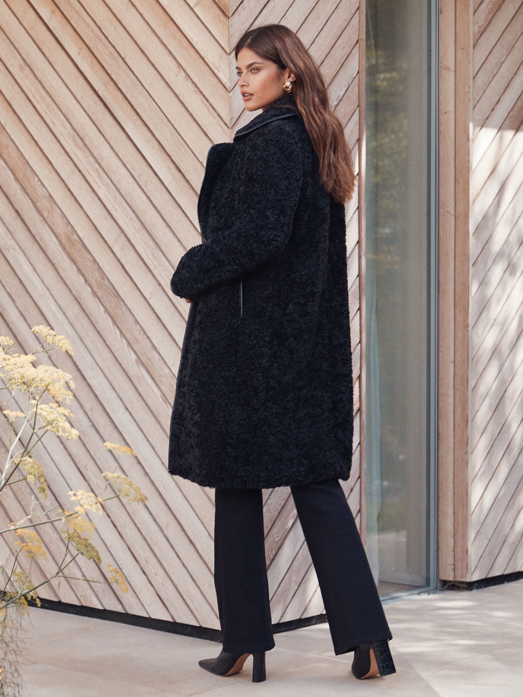 Buy Lipsy Black Petite Teddy Borg Coat with Faux Leather Trim from