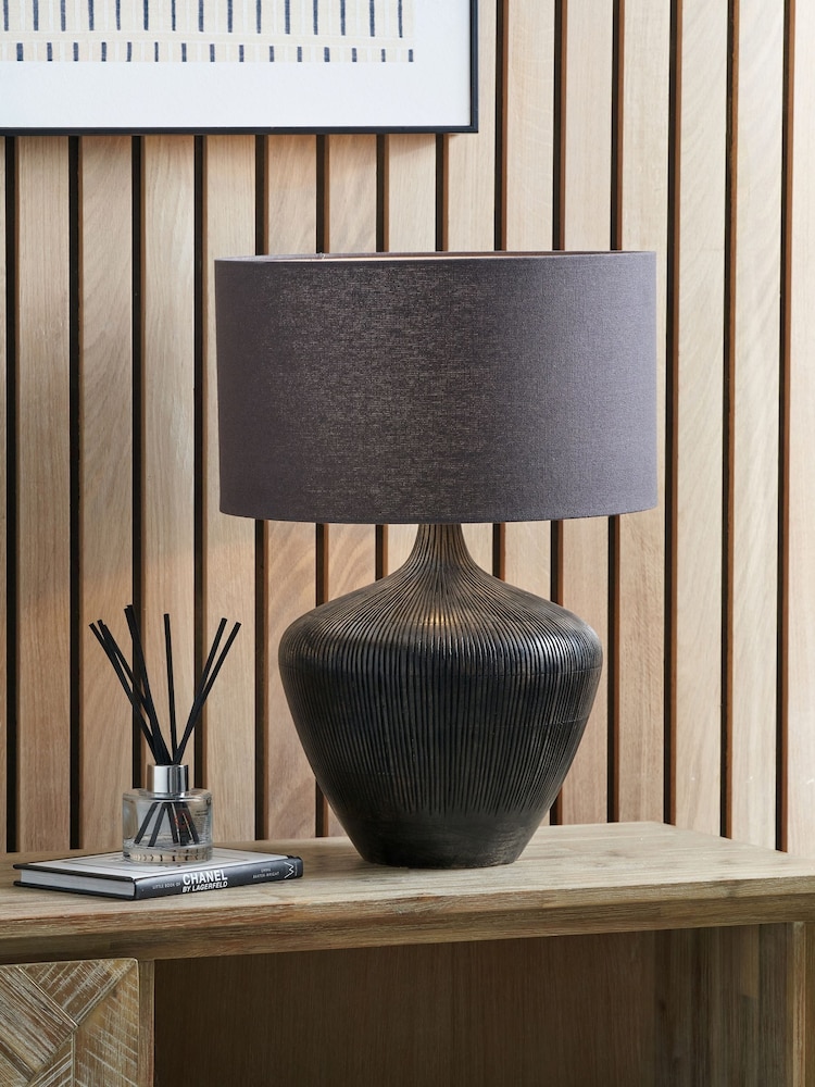 Pacific Lifestyle Black Manaia Antique Textured Wood Table Lamp - Image 1 of 4