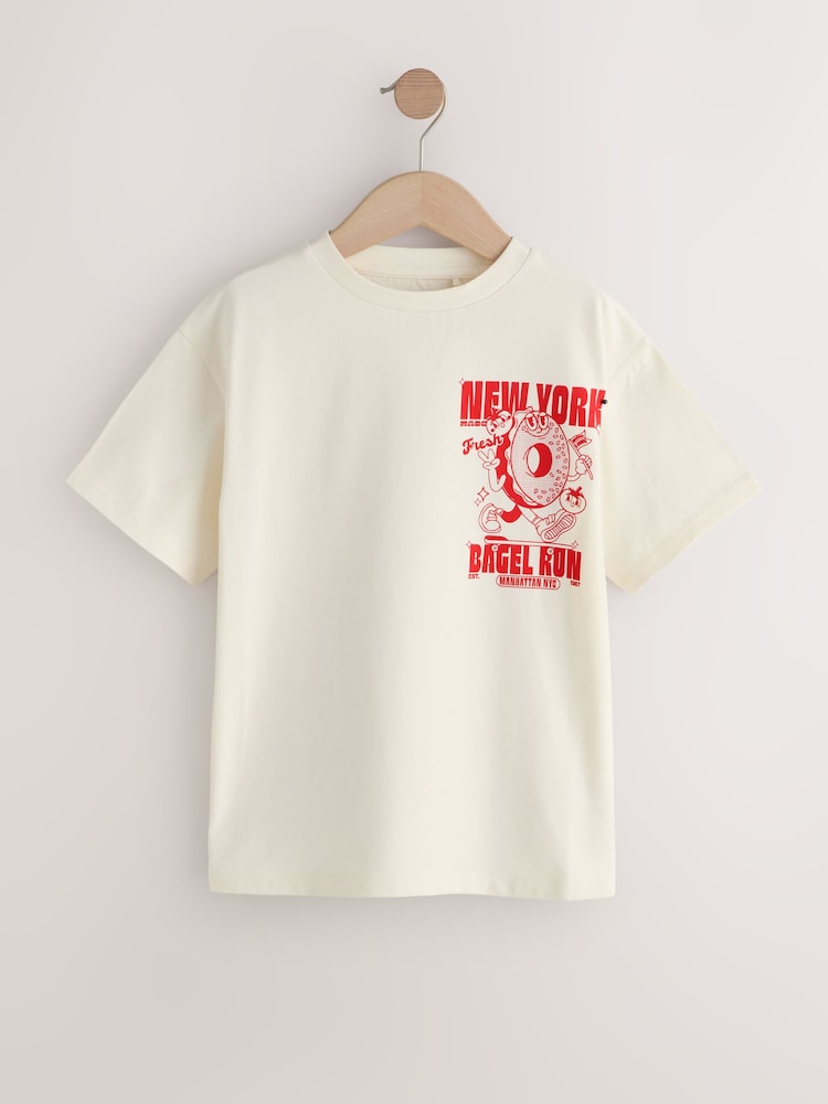 Ecru Bagel - تيشرت فضفاض مزين بطبعة جرافيك (3-16 سنة) - صورة 1 من 4 Ecru Bagel - تيشرت فضفاض مزين بطبعة جرافيك (3-16 سنة) - صورة 1 من 4