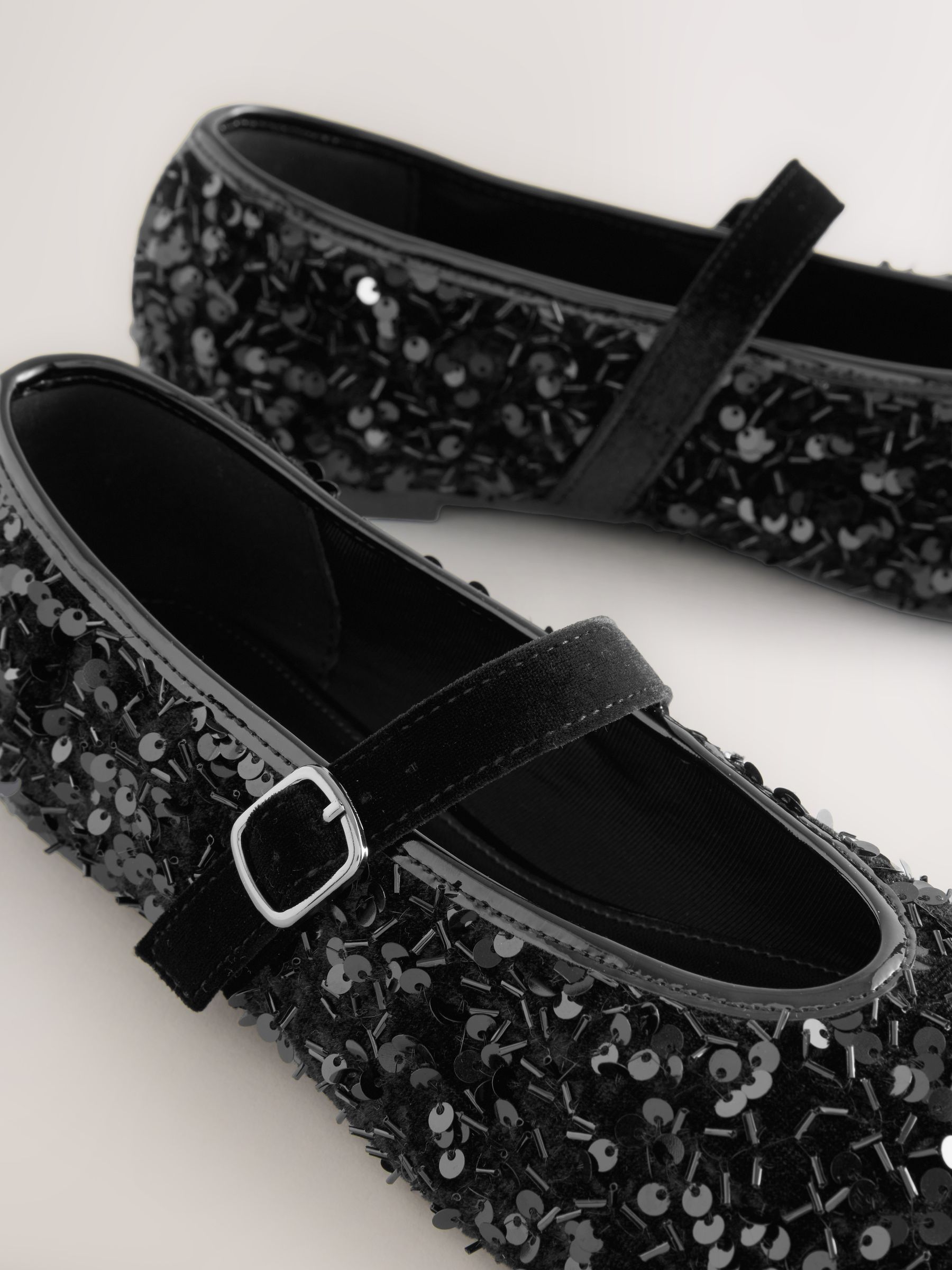 Y2k does 1970s sequin Mary Jane platforms