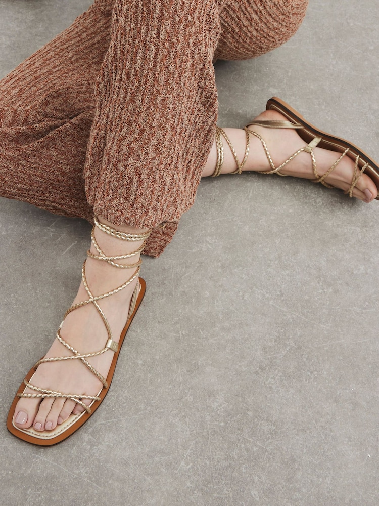 River Island Gold Plaited Tie Up Gladiator Flat Sandals - Image 1 of 1 River Island Gold Plaited Tie Up Gladiator Flat Sandals - Image 1 of 1