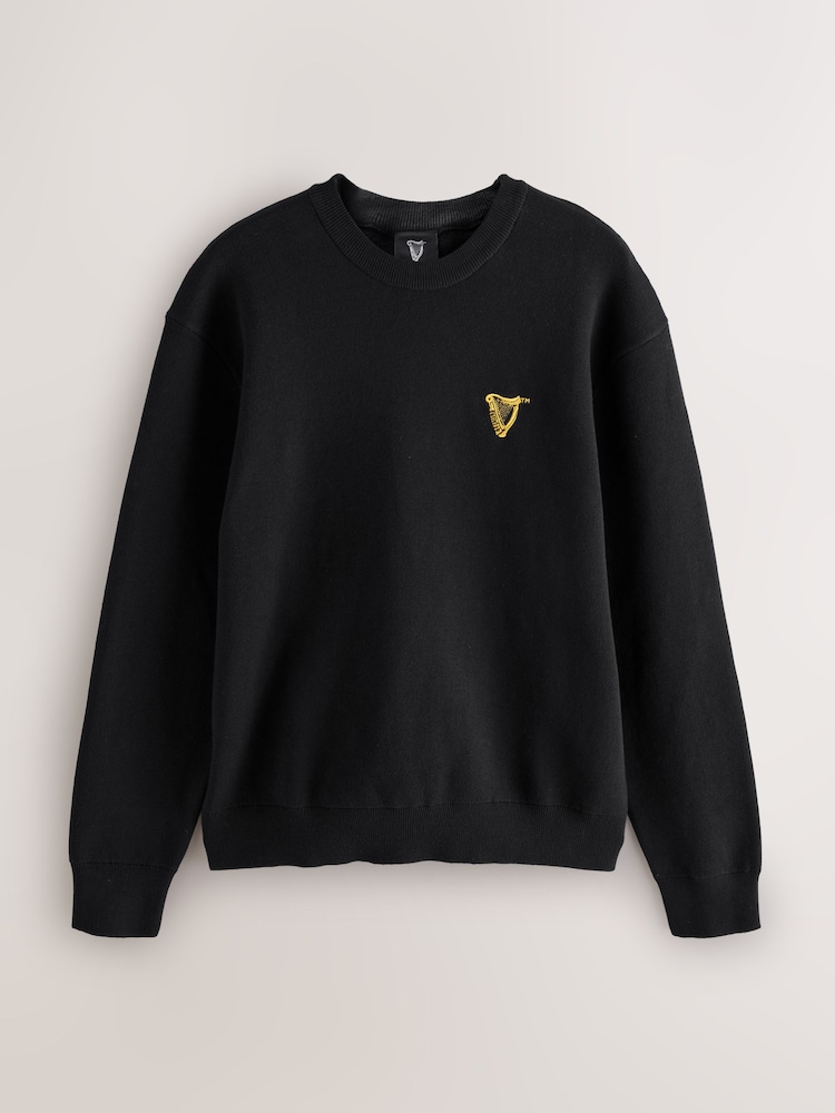 Black Relaxed Fit Guinness License Graphic Crew Neck Jumper - Image 1 of 4 Black Relaxed Fit Guinness License Graphic Crew Neck Jumper - Image 1 of 4