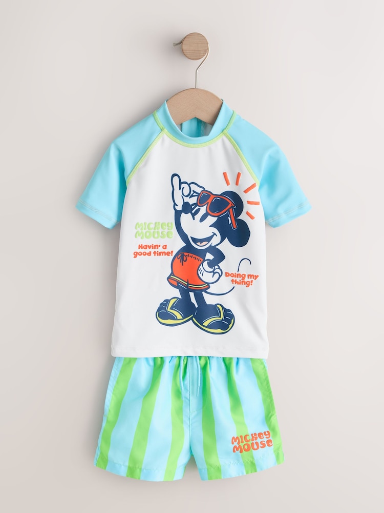 Mickey - Set bluză cu protecție solară și pantaloni scurți de baie (3luni-7ani) - Imaginea 1 din 4 Mickey - Set bluză cu protecție solară și pantaloni scurți de baie (3luni-7ani) - Imaginea 1 din 4