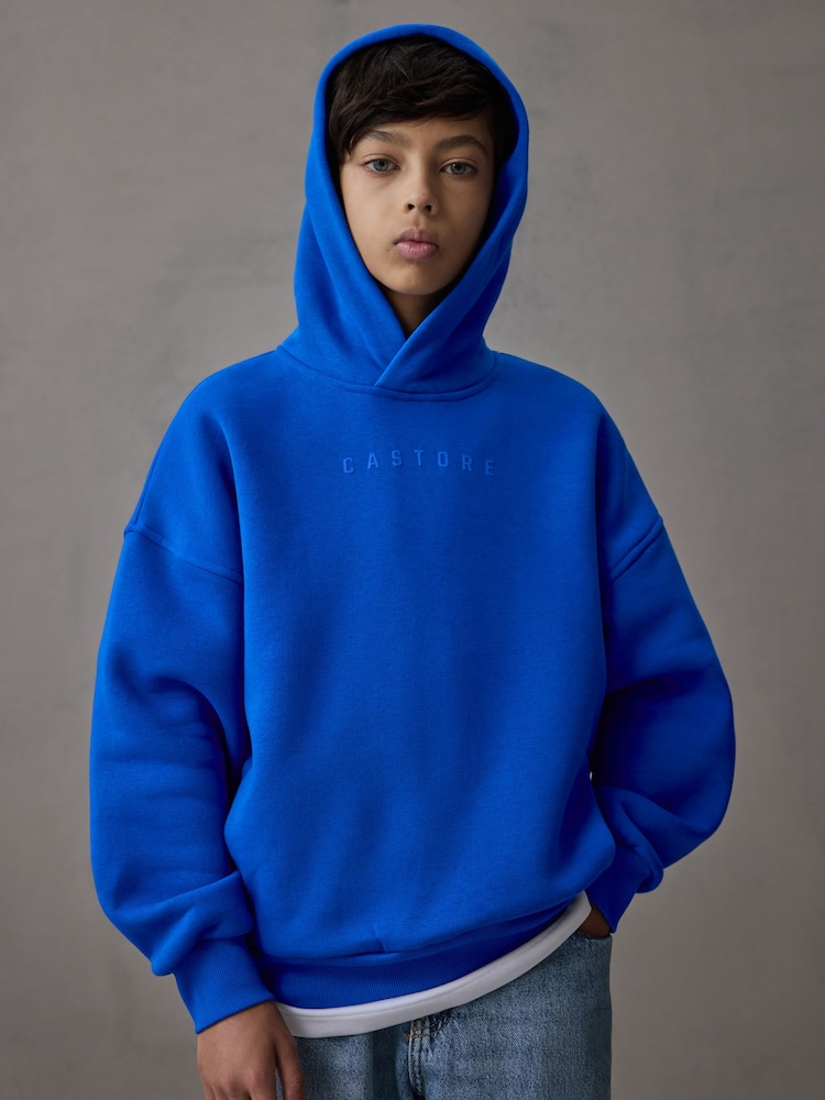 Castore Cobalt Blue Logo Long Sleeve Cotton Hoodie - Image 1 of 9 Castore Cobalt Blue Logo Long Sleeve Cotton Hoodie - Image 1 of 9