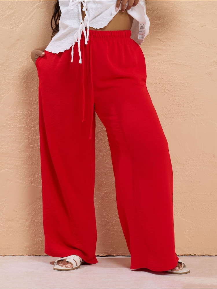 Yours Curve Red Popcorn Skinny Waist Midaxi Trousers - Image 1 of 5