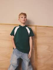 أخضر/أبيض - قميص بولو بكُم قصير بألوان متعارضة (3-16 سنة) - صورة 1 من 8