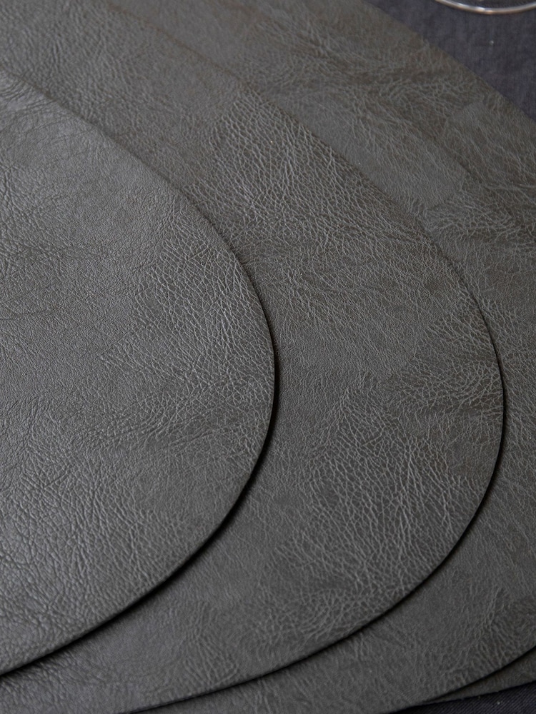 Mikasa Set of 4 Black Pebble-Shaped Faux Leather Placemats - Image 1 of 6