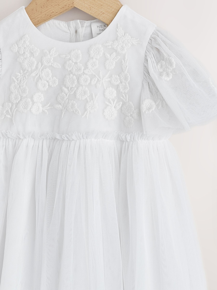next white embroidered dress Next's embroidered white mini dress with pockets is the easy summer style you'll wear on repeat