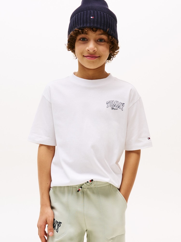 Tommy Hilfiger White Varsity Back Graphic T-Shirt - Image 1 of 4 Tommy Hilfiger White Varsity Back Graphic T-Shirt - Image 1 of 4