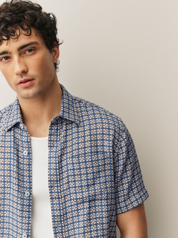 أزرق - قميص مزركش مربعات بكم قصير - Image 1 of 7 أزرق - قميص مزركش مربعات بكم قصير - Image 1 of 7