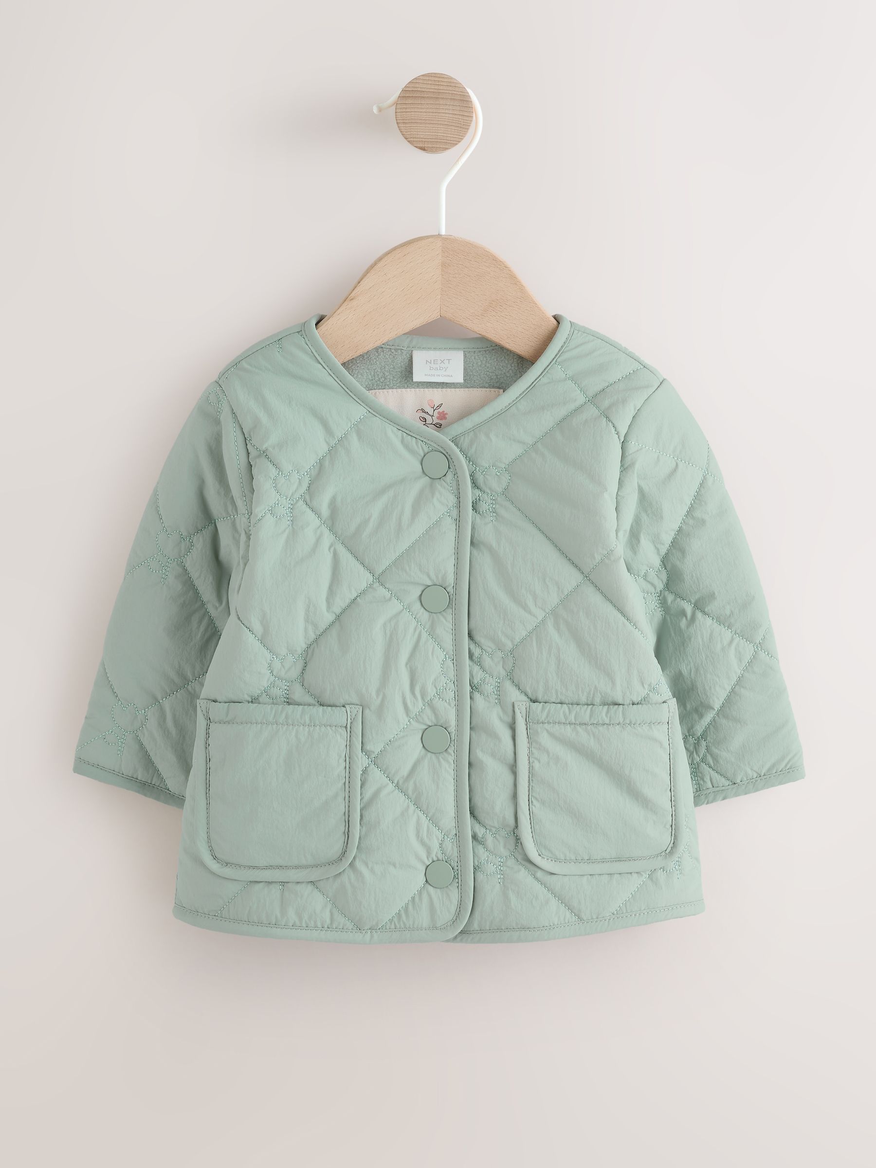 Buy Sage Green Tulip Quilted Nylon Baby Jacket (0mths-2yrs) from