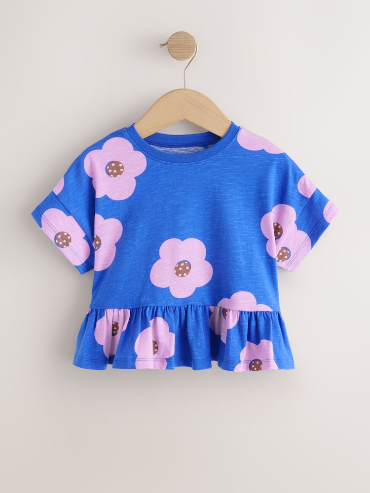 Blue Lilac Flower - Short Sleeve Peplum T-Shirt (3mths-7yrs) - Bild 1 von 4 Blue Lilac Flower - Short Sleeve Peplum T-Shirt (3mths-7yrs) - Bild 1 von 4