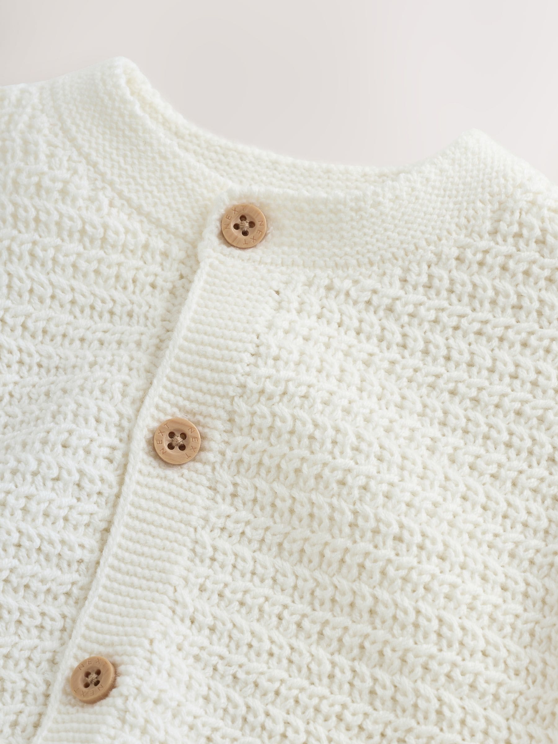 Comprar white texturizado - Casaquinho de tricô para bebê from