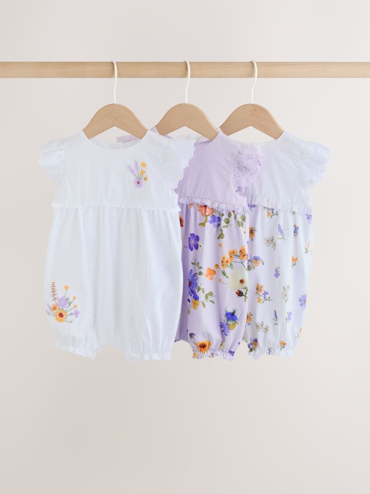 Purple and White Floral Broderie Broderie 3 Pack Baby Rompers - Image 1 of 10 Purple and White Floral Broderie Broderie 3 Pack Baby Rompers - Image 1 of 10