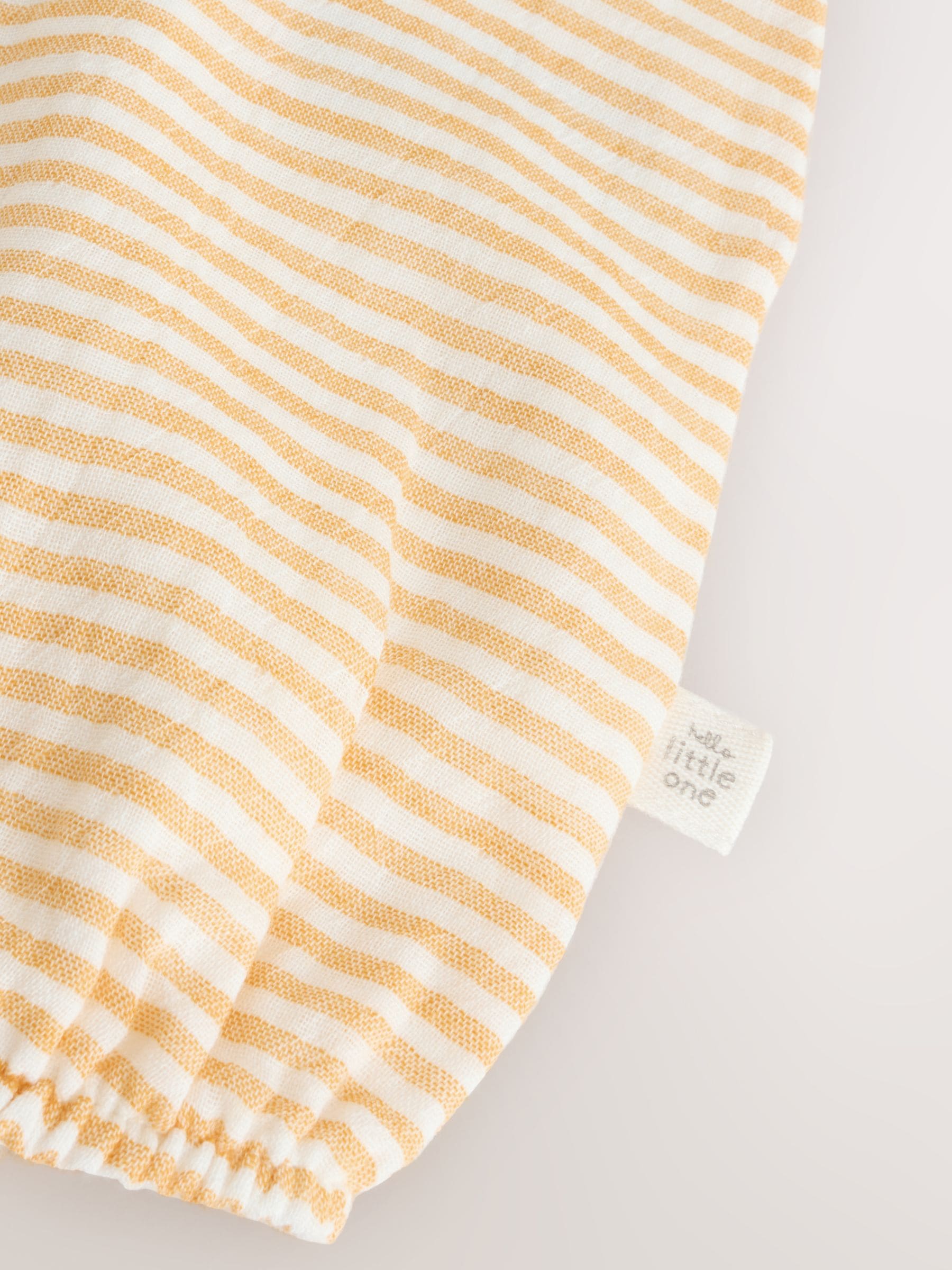 Buy Yellow Little Chick Baby Woven Romper (0mths-3yrs) from Next