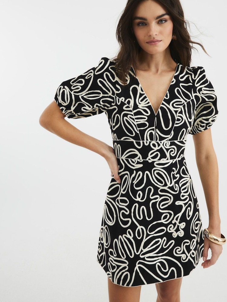 River Island Black Puff Sleeve Floral Print 100% Cotton Mini Dress - Image 2 of 4 River Island Black Puff Sleeve Floral Print 100% Cotton Mini Dress - Image 2 of 4