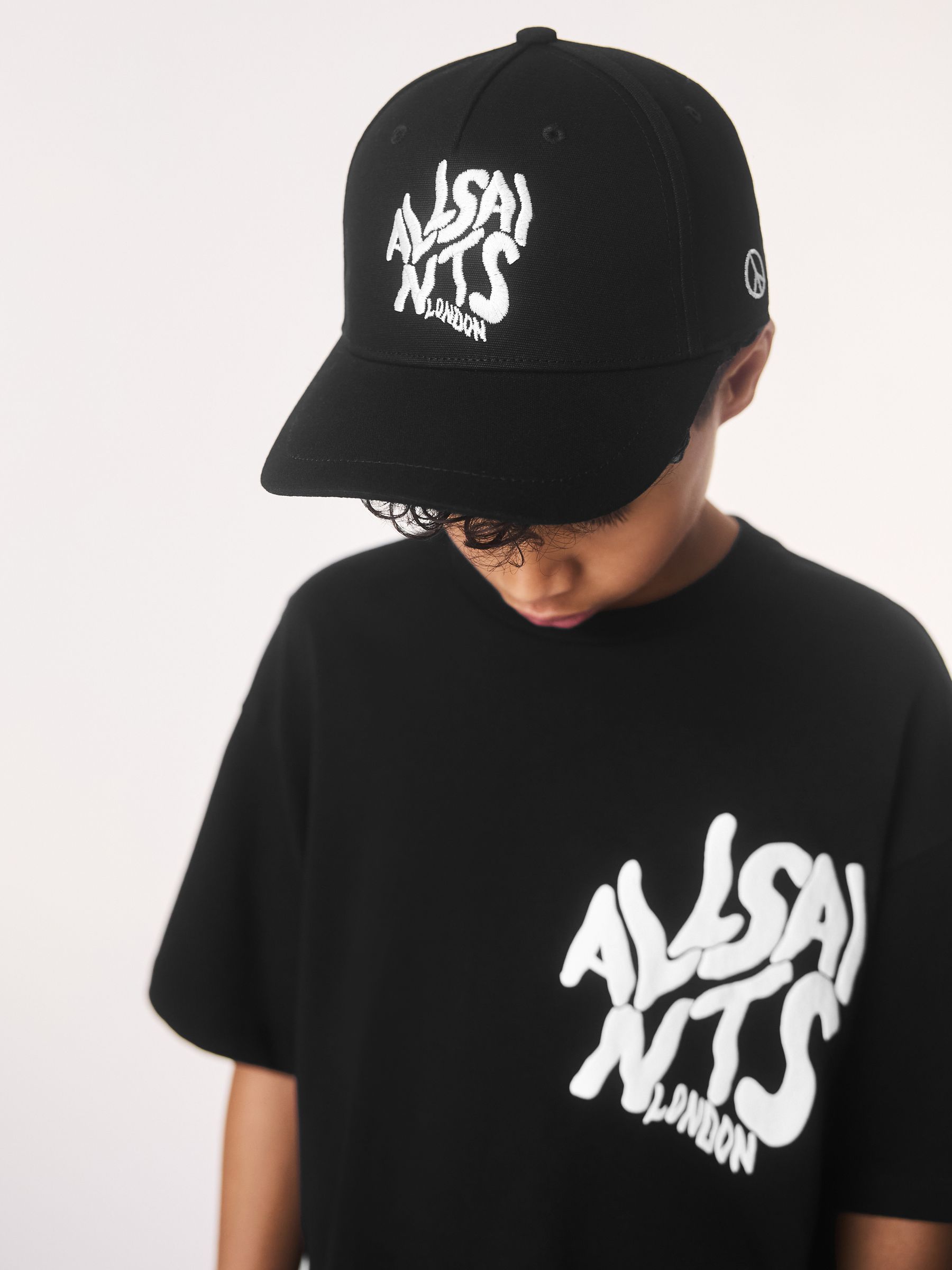 Buy smALLSAINTS Black Logo Baseball Cap from the Next UK online shop