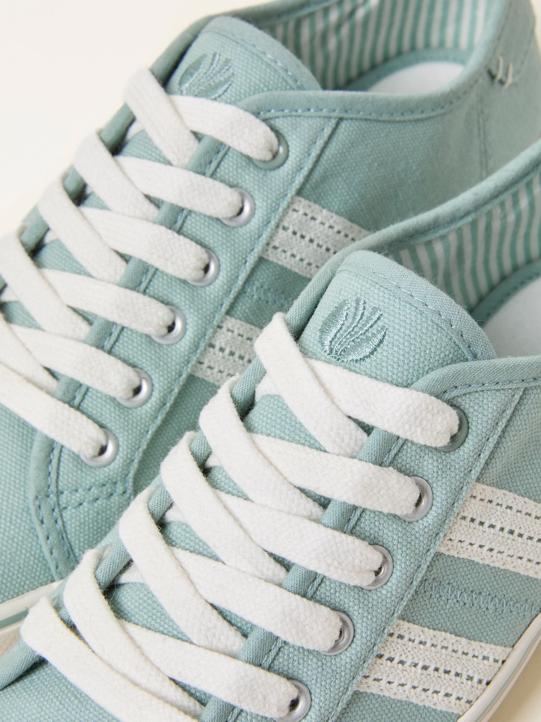 Buy FatFace Lola Green Haze Canvas Trainer from Next Singapore