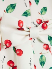 River Island Cream Girls Cherry Bow Back Dress - Image 4 of 4