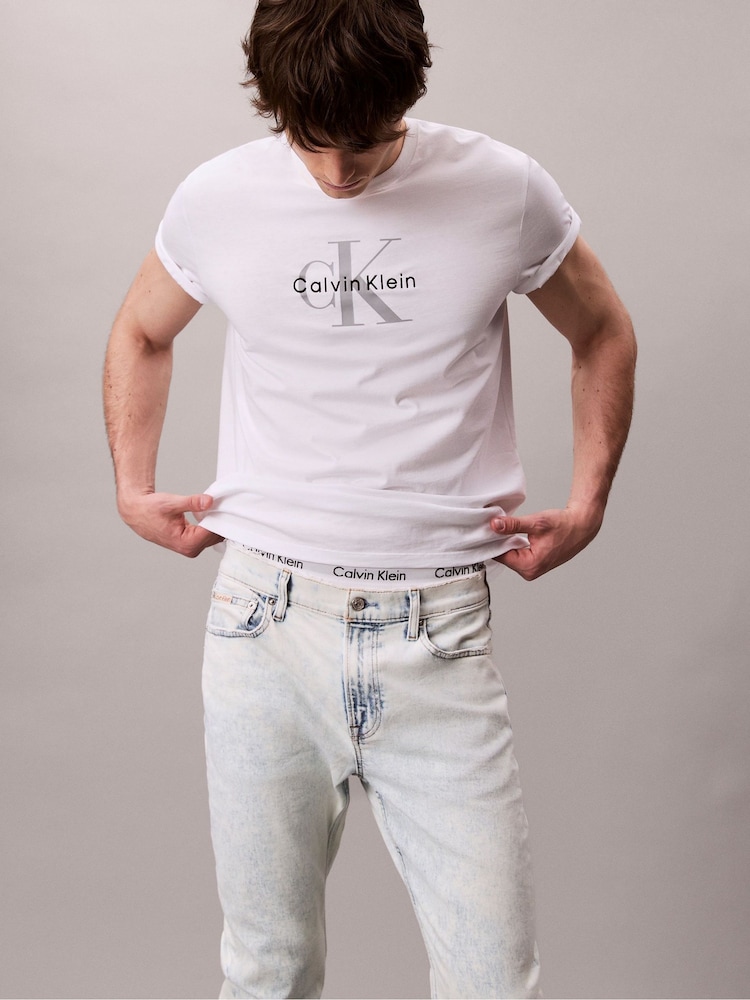 Calvin Klein Blue Slim Tapered Denim Jeans - Image 2 of 6 Calvin Klein Blue Slim Tapered Denim Jeans - Image 2 of 6