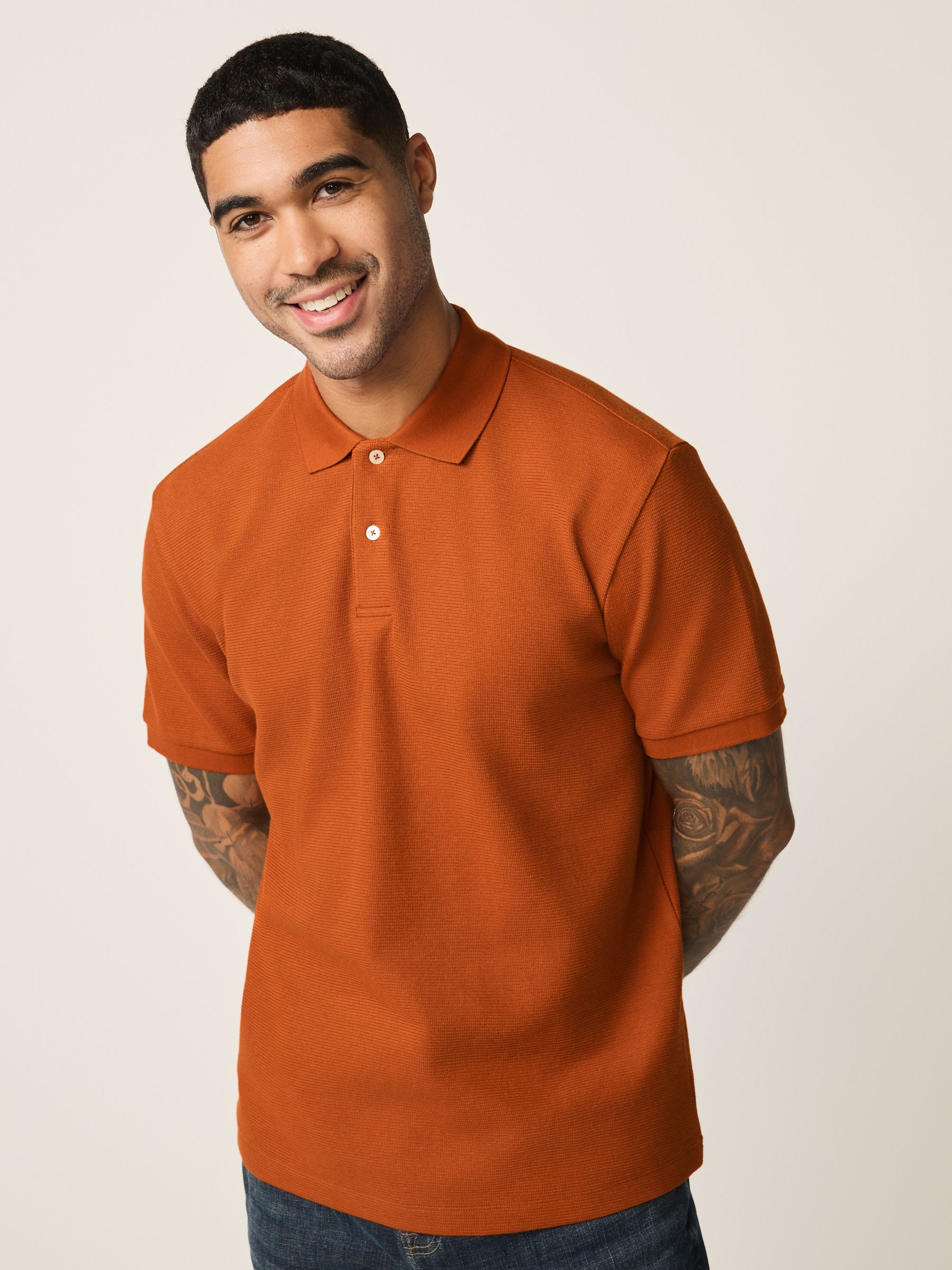 Buy Orange Regular Fit Textured Smart Polo Shirts from Next USA