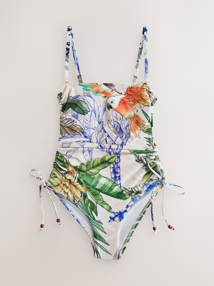 Cream/Navy Parrot Placement Print Bandeau Ruched Leg Tummy Control Shaping Swimsuit - Image 1 of 4 Cream/Navy Parrot Placement Print Bandeau Ruched Leg Tummy Control Shaping Swimsuit - Image 1 of 4