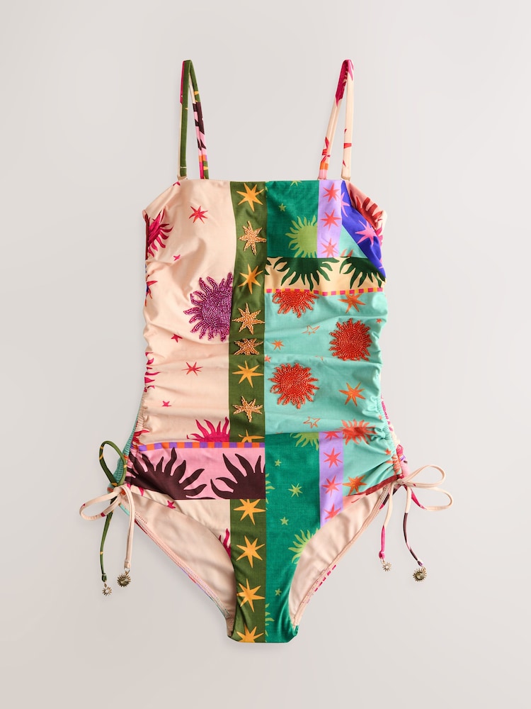 Pink/Green Embellished Beaded Star Print Bandeau Ruched Leg Tummy Control Shaping Swimsuit - Image 1 of 4 Pink/Green Embellished Beaded Star Print Bandeau Ruched Leg Tummy Control Shaping Swimsuit - Image 1 of 4