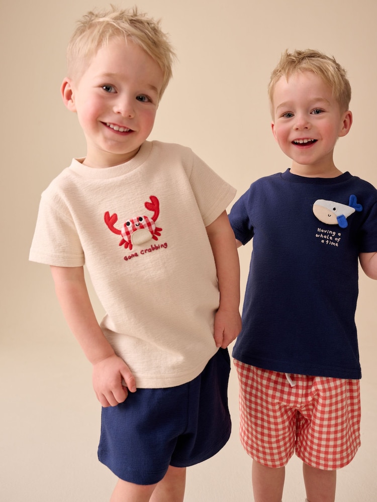 Navy/Cream Padded Sea Animals Short Sleeve T-Shirt and Shorts Set 2 Pack (3mths-7yrs) - Image 1 of 5 Navy/Cream Padded Sea Animals Short Sleeve T-Shirt and Shorts Set 2 Pack (3mths-7yrs) - Image 1 of 5