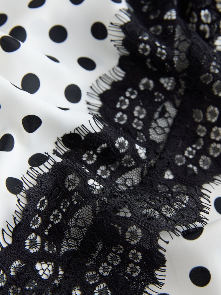 Buy Black/White Polka Dot Strappy Satin Cami Midi Dress With Lace Trim from Next USA Buy Black/White Polka Dot Strappy Satin Cami Midi Dress With Lace Trim from Next USA