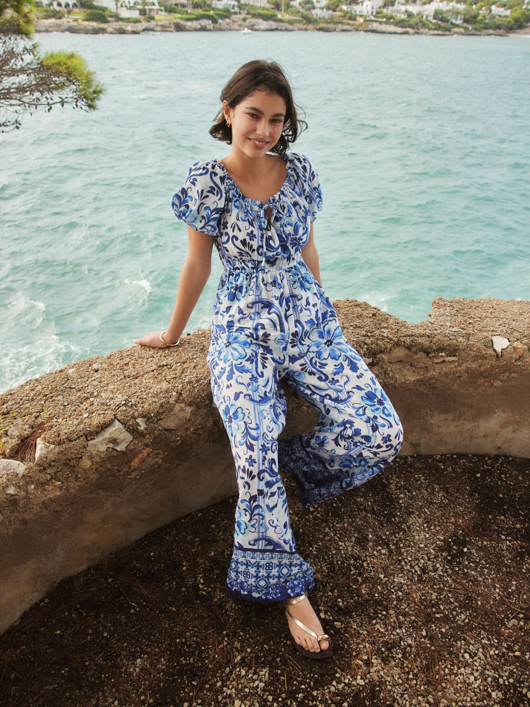 Buy White/Blue Floral Print Off the Shoulder Jumpsuit from the