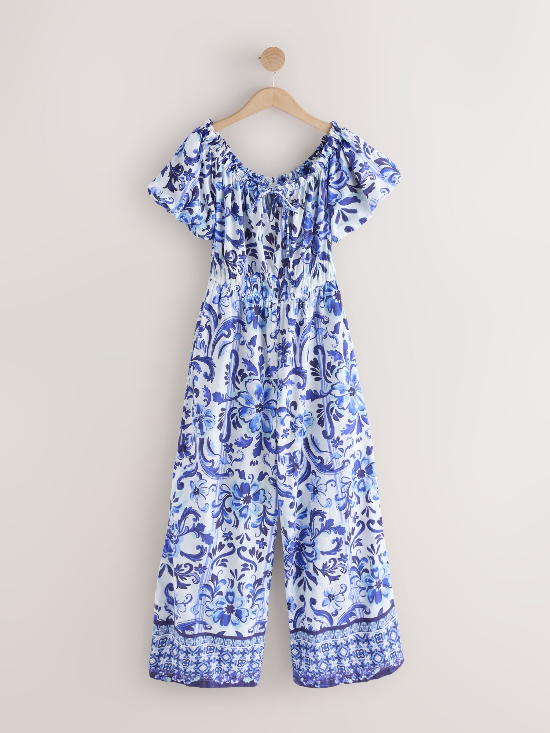 Buy White/Blue Floral Print Off the Shoulder Jumpsuit from Next USA