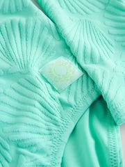 أخضر نعناعي ـ طبعة صدف - بدلة سباحة محببة بأكمام طويلة واقية من الشمس (3-16سنة) - صورة 7 من 8