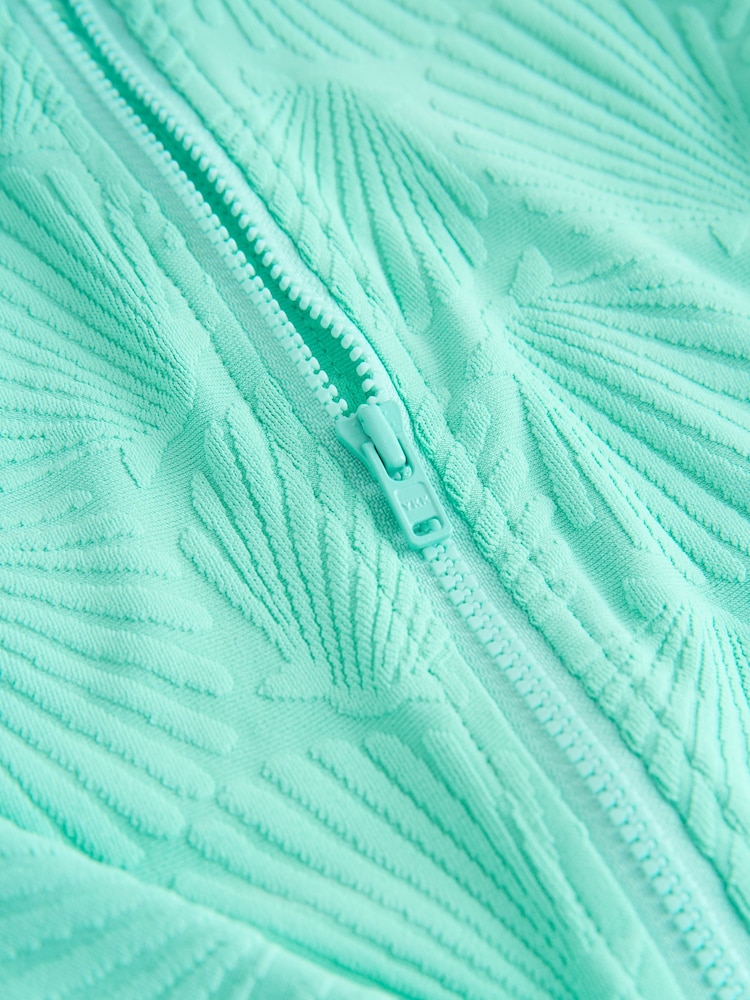 أخضر نعناعي ـ طبعة صدف - بدلة سباحة محببة بأكمام طويلة واقية من الشمس (3-16سنة) - صورة 8 من 8