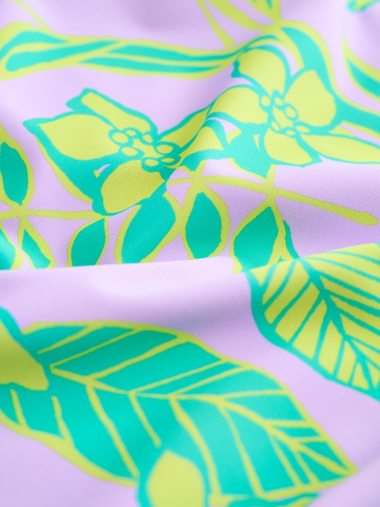 أرجواني فاتح - تصميم استوائي - Short Sleeved Sunsafe Swimsuit (3mths-16yrs) - صورة 4 من 4 أرجواني فاتح - تصميم استوائي - Short Sleeved Sunsafe Swimsuit (3mths-16yrs) - صورة 4 من 4