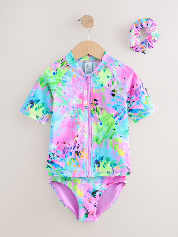 Pink Tie Dye Splat - Sunsafe Rash Vest Bikini and Scrunchie Set (3-16yrs) - صورة 1 من 4 Pink Tie Dye Splat - Sunsafe Rash Vest Bikini and Scrunchie Set (3-16yrs) - صورة 1 من 4