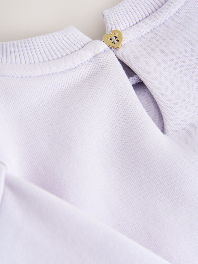 Baker by Ted Baker 2 Piece Satin Bow Bubble Hem Sweat Top & Flare Leggings Set - Image 14 of 14 Baker by Ted Baker 2 Piece Satin Bow Bubble Hem Sweat Top & Flare Leggings Set - Image 14 of 14