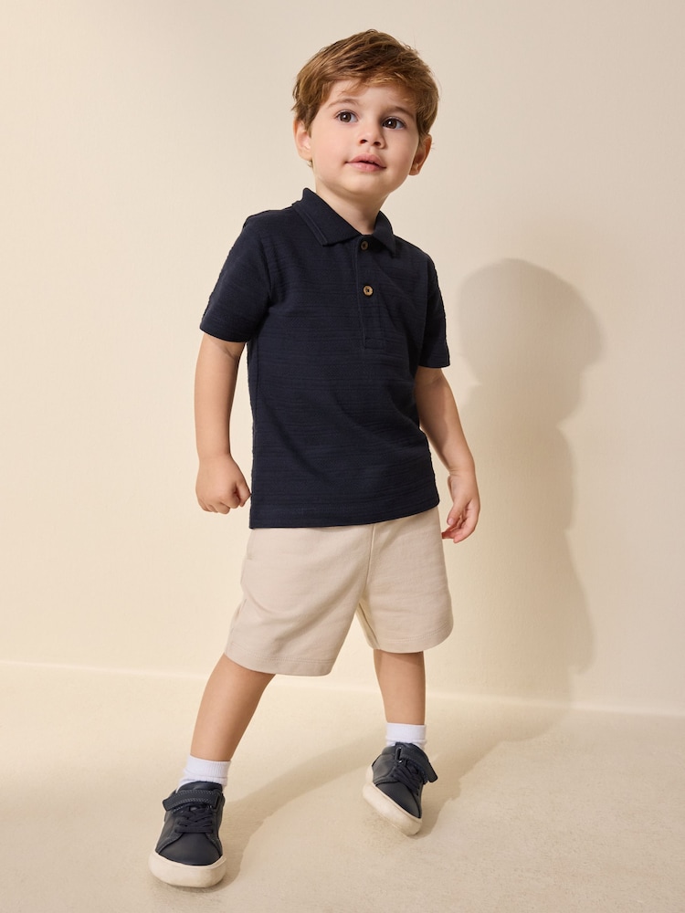 Navy Short Sleeve Textured Polo Shirt and Shorts Set (3mths-7yrs) - Image 1 of 3 Navy Short Sleeve Textured Polo Shirt and Shorts Set (3mths-7yrs) - Image 1 of 3