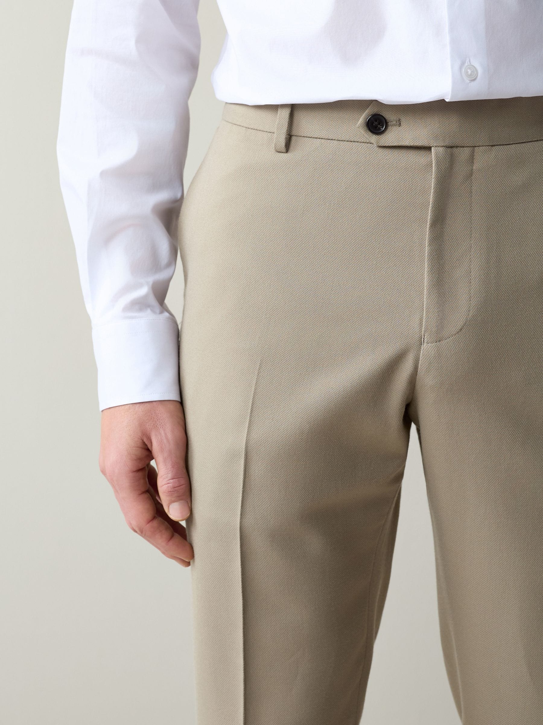 Buy Stone Slim Fit Textured Suit Trousers from the Next UK online shop