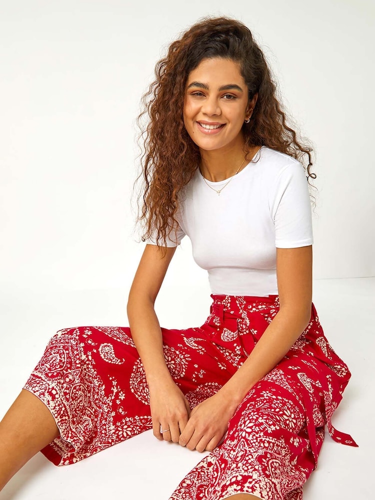 Pantalones de pernera ancha y corte cónico con estampado de cachemira de Roman - Imagen 1 de 5 Pantalones de pernera ancha y corte cónico con estampado de cachemira de Roman - Imagen 1 de 5