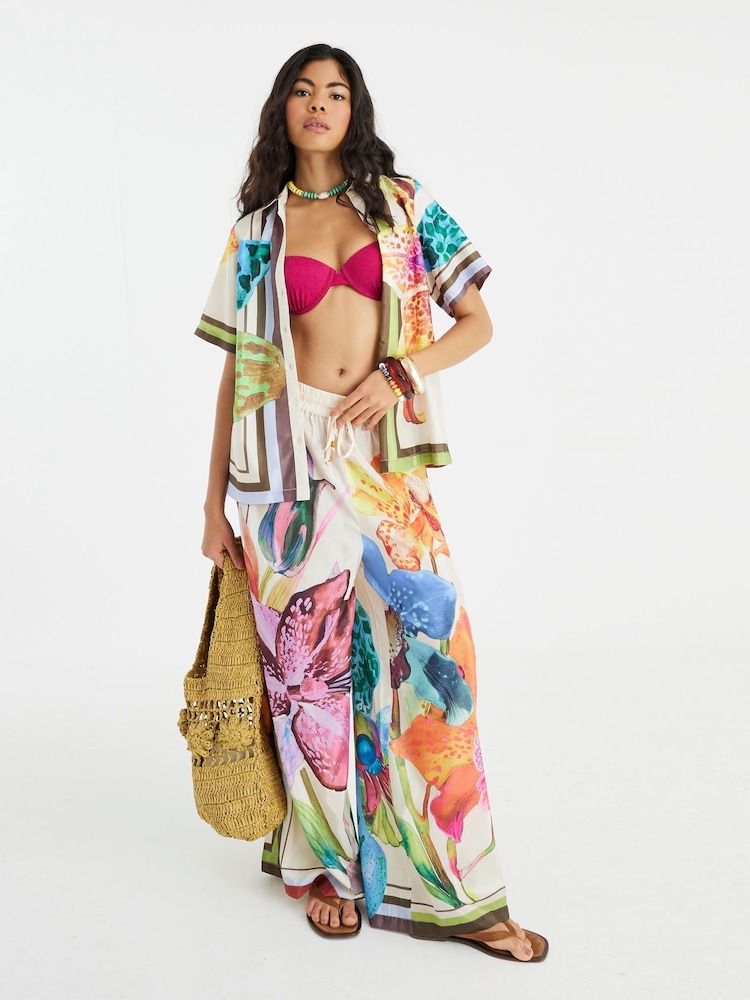 Camisa de praia com estampa tropical multicolorida River Island - Imagem 1 de 4