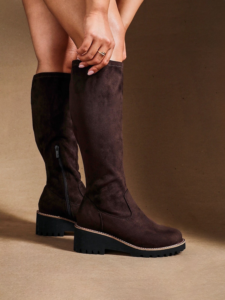Linzi Brown Wide Fit Maintain Stretch High Leg Wedge Boots - Image 1 of 6 Linzi Brown Wide Fit Maintain Stretch High Leg Wedge Boots - Image 1 of 6
