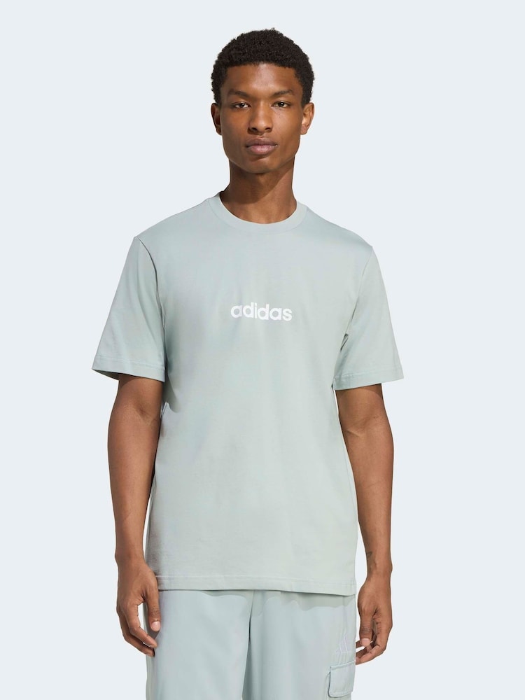 adidas Light Green Single Essentials Linear 100% Cotton Jersey T-Shirt - Image 1 of 6 adidas Light Green Single Essentials Linear 100% Cotton Jersey T-Shirt - Image 1 of 6