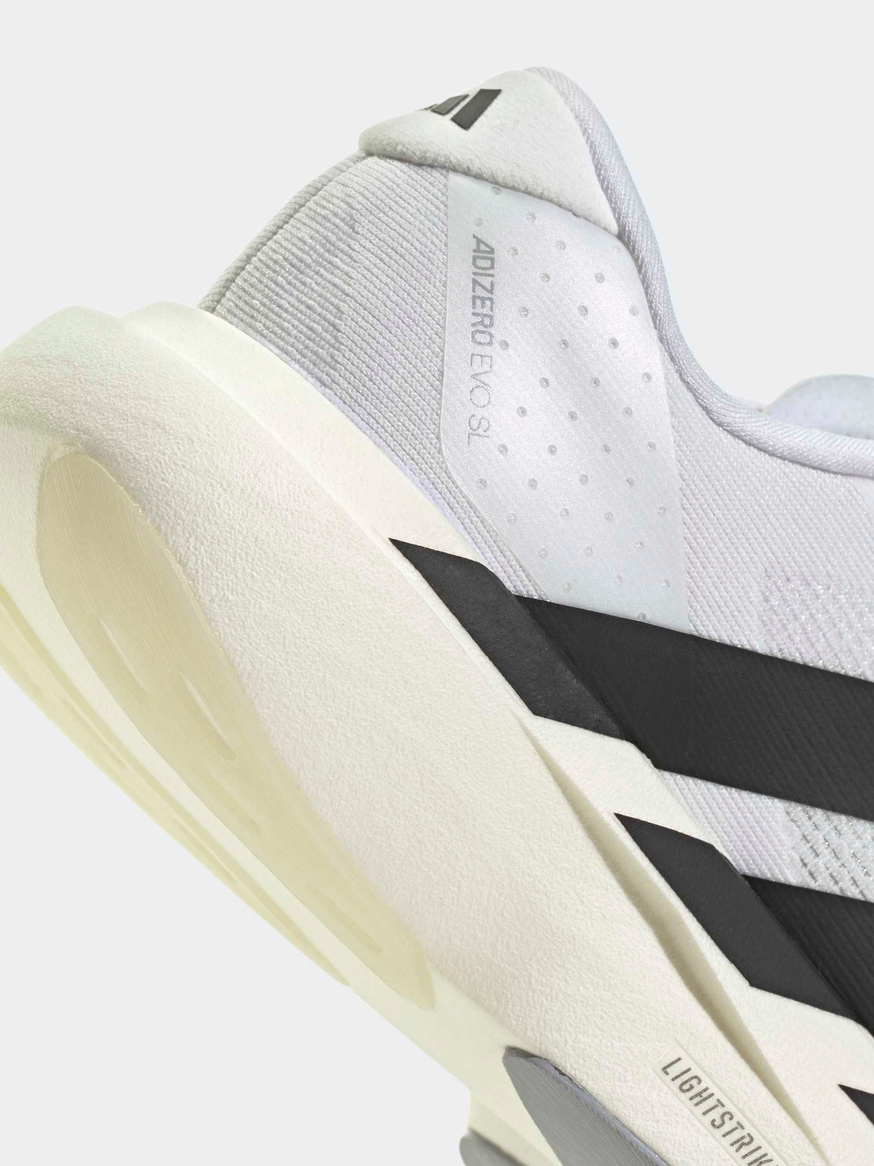 Buy adidas White adizero Evo SL Junior Trainers from Next USA