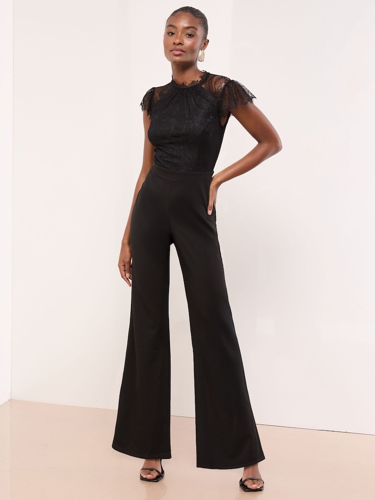 Lipsy Black Petite Lace High Neck Short Sleeve Jumpsuit - Image 1 of 4 Lipsy Black Petite Lace High Neck Short Sleeve Jumpsuit - Image 1 of 4