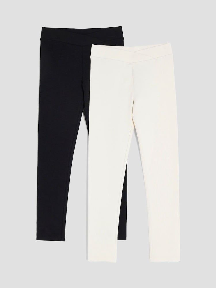River Island Cream Girls Cross Front Leggings 2 Pack - Image 1 of 4 River Island Cream Girls Cross Front Leggings 2 Pack - Image 1 of 4