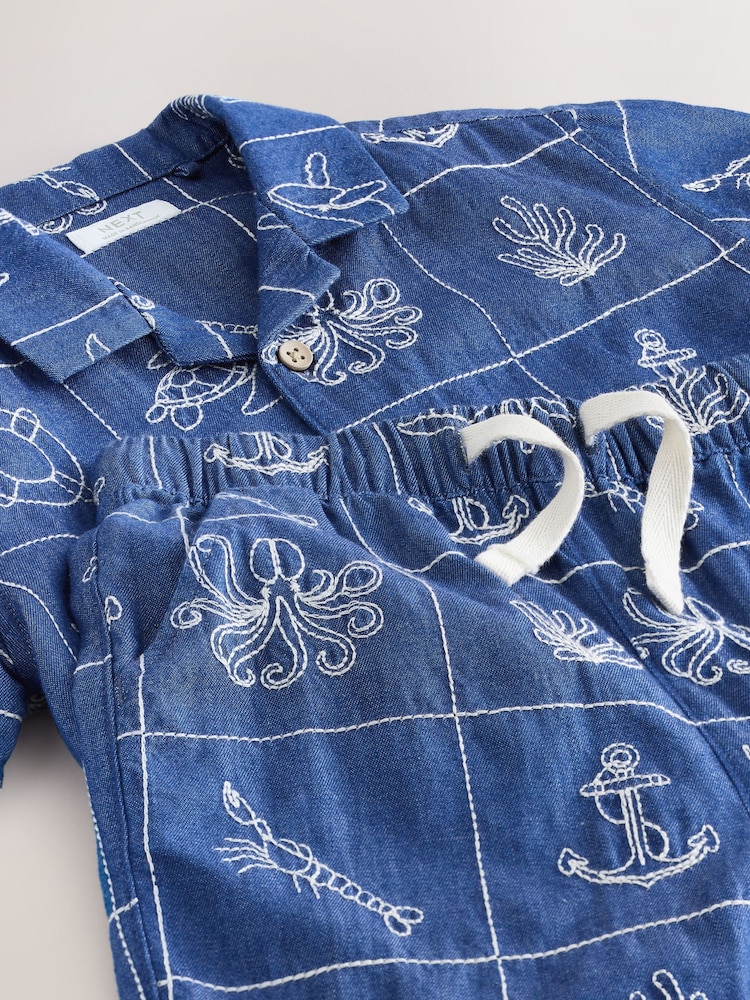 Blue Denim Sea Life Embroidery - Short Sleeve Revere Collar Shirt & Shorts Set (3mths-10yrs) - Attēls 9 no 9 Blue Denim Sea Life Embroidery - Short Sleeve Revere Collar Shirt & Shorts Set (3mths-10yrs) - Attēls 9 no 9