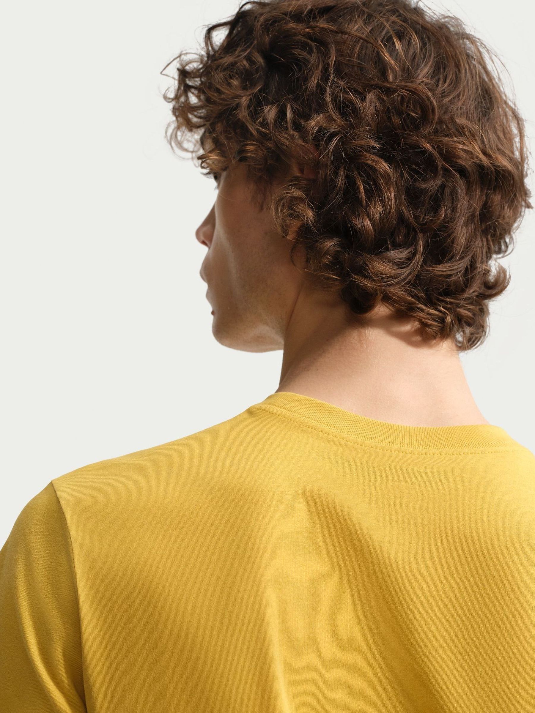 Buy Nike Saffron Yellow Short Sleeve Club T-Shirt from the Next UK