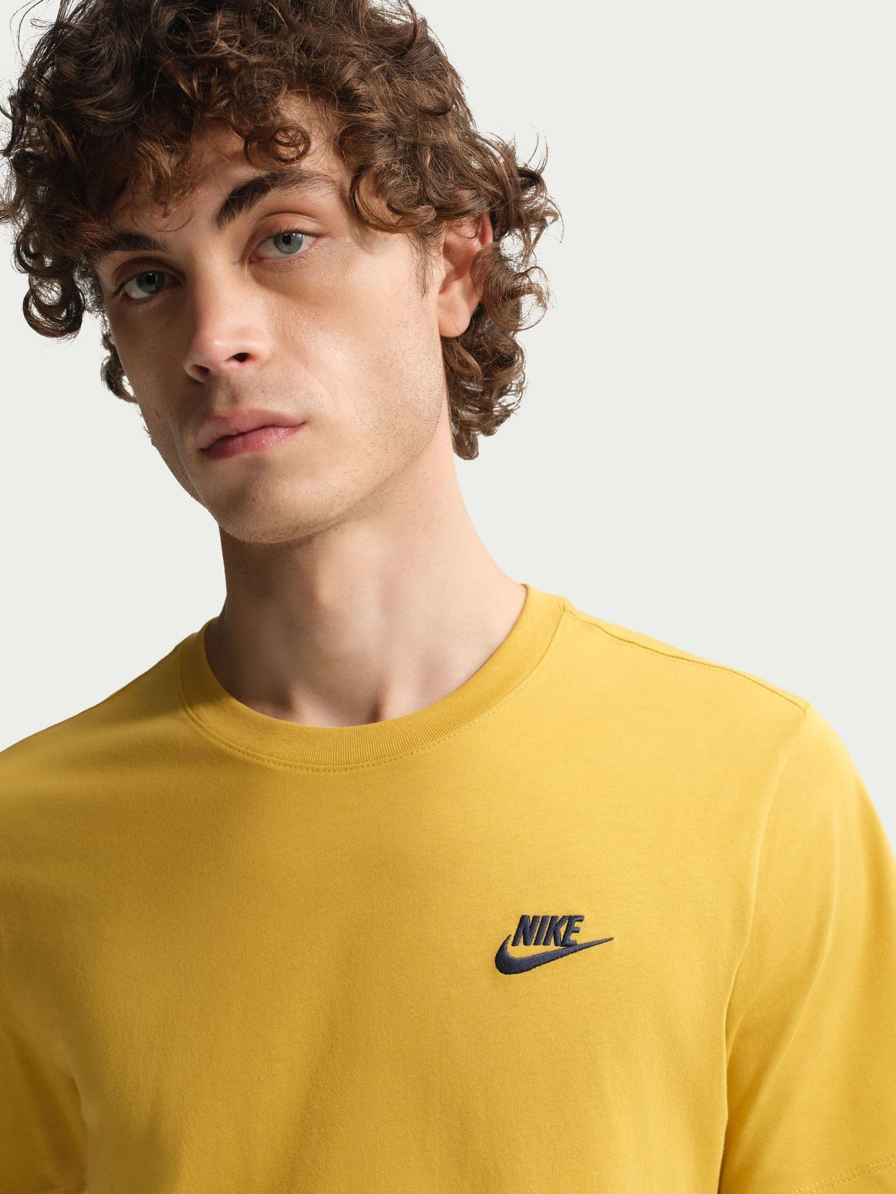 yellow and white nike shirts