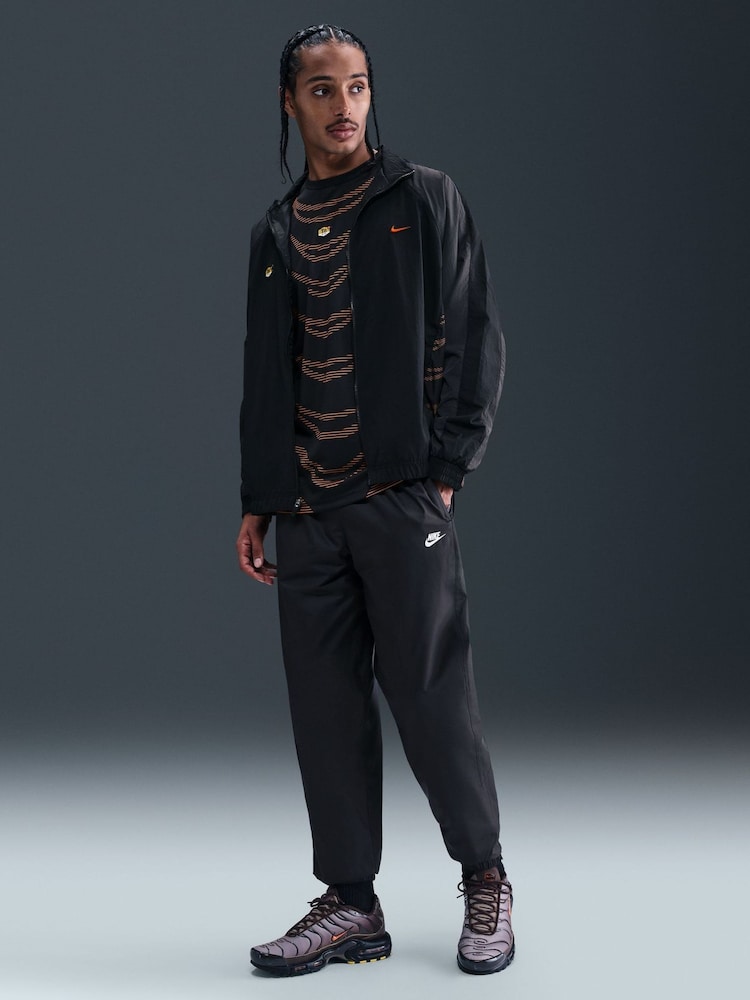 Nike Black Windrunner Lined Joggers - Image 1 of 10 Nike Black Windrunner Lined Joggers - Image 1 of 10