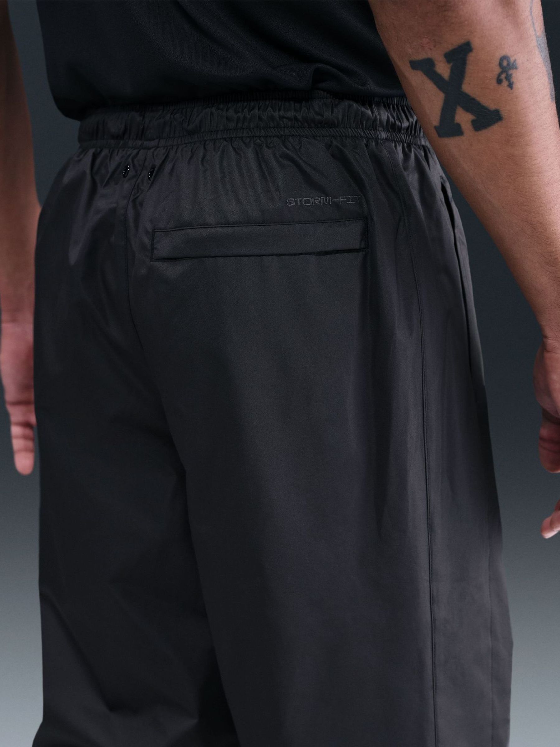 nike heritage essentials windrunner cuffed woven joggers in black